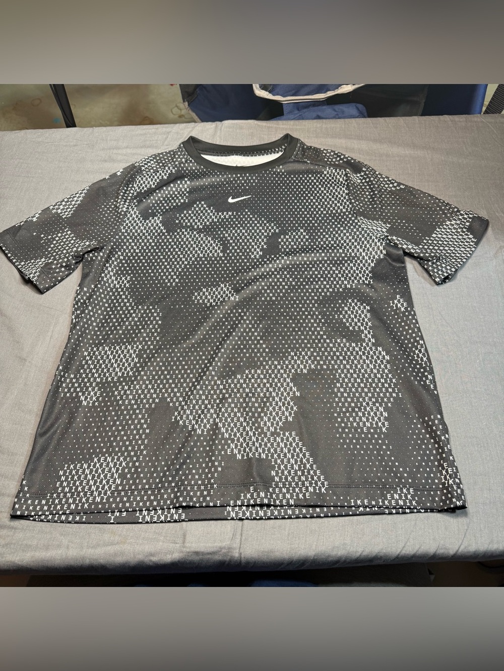 Nike Black Short-Sleeve Graphic Tee with White Micro Print